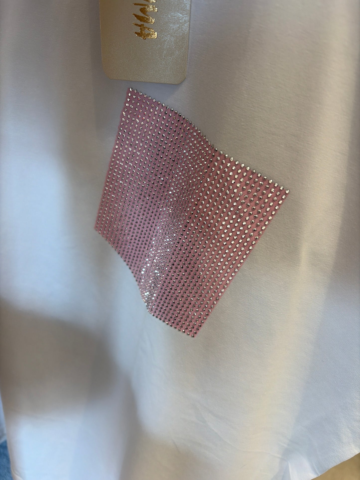 Shirt met glitter zakje