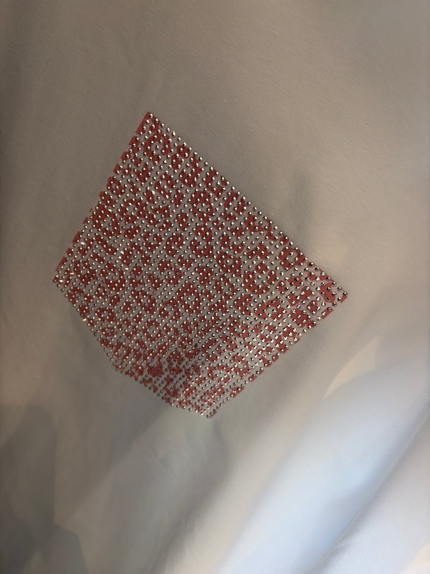 Shirt met glitter zakje