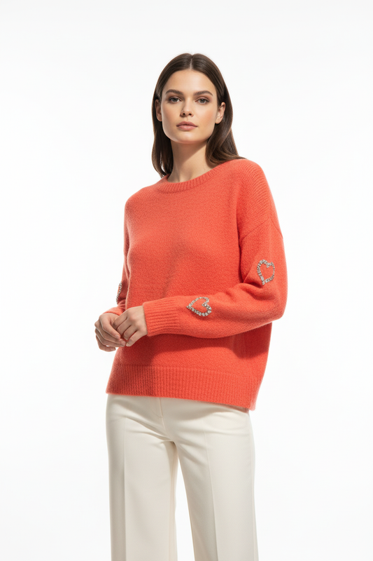 Model draagt Vintage Dressing Love trui - hartje detail in mouw