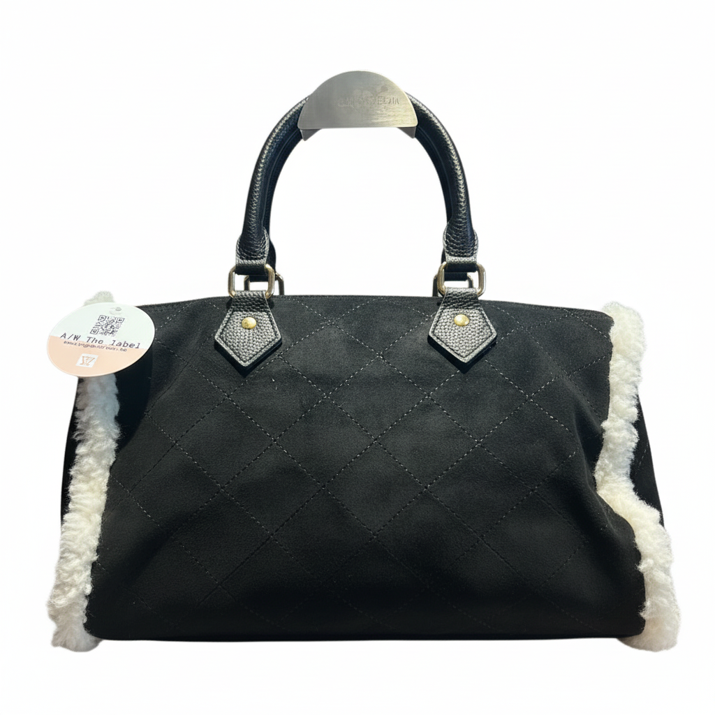 handtas met teddy afwerking - professionele productfoto